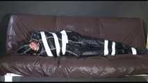 MARA tied, gagged and hoded with tape wearing a supersexy black rain suit (Video)