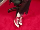 Fetisha in Red Converse High tops