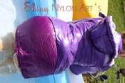 Watching sexy Mara wearing a sexy purple downskirt and a purple downjacket lolling in the swimming pool (Pics)