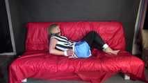 PiA being tied and gagged on a sofa with ropes and a clothgag wearing a sexy lightblue shiny nylon shorts and a white/black striped top (Video)