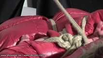 Ivette - tied and gagged in red downcoat