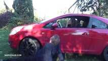 Mistress Cleo smokes and smashes balls with a car