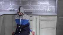  Miss J ziptied in raingear and gagged with inflatable gag