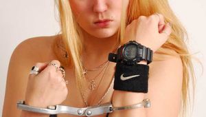 Valery wearing a G-Shock and handcuffs