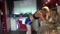 Watching sexy COURTNEY wearing a darkblue shiny nylon shorts and a top while preparing coffee and doing her housework (Video)