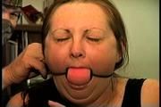 46 Yr OLD REAL ESTATE AGENT'S IS MOUTH STUFFED, HANDGAGGED, CLEAVE AND OTM VET TAPE GAGGED, BALL-GAGGED, CLEAR TAPE GAGGED WITH HANDS TIGHTLY TIED WITH THIN RAWHIDE (D72-5)