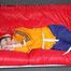 Lucy tied and gagged on a sofa wearing an orange shiny nylon rain jacket and a blue rain pants (Pics)