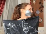 [From archive] Gina Russel - packed in trash bag 2