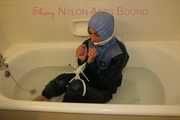 Watching Stella being tied and gagged with ropes and a cloth gag in a bathtub diving under water (Pics)