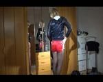 Watching Pia putting on a red shiny nylon shorts and a rain jacket over her nylon tights (Video)