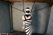 Zebra girl caught and restrained, part 2 of 3