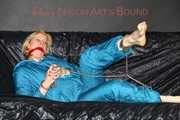 Pia wearing a supersexy oldschool downsuit in green ties and gagges herself with cuffs and a cloth gag (Pics)