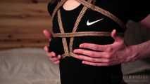 Posing in tight jute shibari