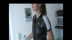 Get 2 Videos with Alina enjoying her Shiny Nylon Rainwear at home from our 2010 Archive