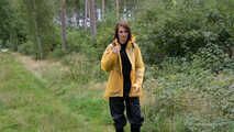 Miss Petra takes a walk in Hunter rain jacket, rain pants and rubber boots (very exclusive set with expensive rain gear and looped video)