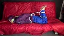 SANDRA being tied and gagged on a sofa with ropes and a clothgag wearing a sexy blue shiny nylon rain pants and a purple rain jacket  (Video)