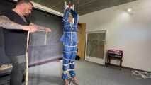 Ms ungeniert tied, gagged, suspended ind a shiny nylon Rainsuit and finally bullwhipped