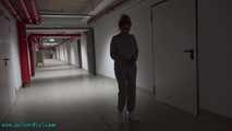 Tamara is walking in cuffs at the basement