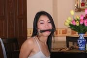 Cute Bound and Gagged Asian is Sitting on the Stool all Helpless and Ready