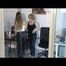 Katharina and an archive girl wearing different rainwear and downwear during the day (Video)