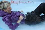 Watching sexy Sonja wearing a supersexy black rain pants and a purple down jacket taking a bath in the swimming pool (Pics)
