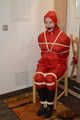 Bondage in  red nylon rainwear