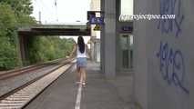 068005 Ling Pees On The Station Platform