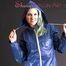 Mara wearing a very hot blue rain skirt and a rain jacket as well as red rubber boots posing for you in a photo studio (Pics)