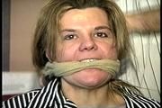 38 Yr OLD SOCIAL WORKER GETS HANDGAGGED, SOCK STUFFED IN MOUTH, MOUTH STUFFED, CLEAVE GAGGED AND TIED TO A CHAIR (D69-3)