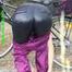 Watch Sandra riding her bike enjoying her shiny nylon Rainwear