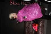 ***NEW MODELL COURTNEY*** wearing a sexy black shiny nylon rain pant and several shiny nylon raincapes in different colours (Pics)