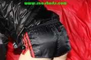 Sexy Sonja wearing sexy shiny nylon shorts and a rain jacket during preparing her sofa with nylon cloth (Pics)