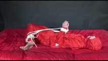 *** HOT HOT HOT*** NEW MODELL*** DESTINY wearing a new sexy red shiny nylon rain suit tied and gagged on bed with ropes and a cloth gag (Video)