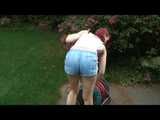 *** Watching sexy archive girl wearing a sexy lightblue shiny nylon shorts and a white tshirt tidying up the terasse  (Video)***