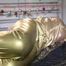 Pia tied, gagged and hooded on bed wearing a sexy golden rain combination and wings (Pics)