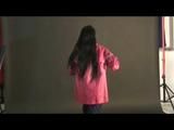 Blackhaired archive girl posing in sexy shiny nylon rainwear (Video)