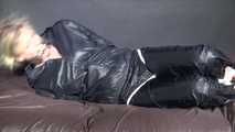 Watching Pia being tied and gagged with ropes and a clothgag wearing sex black shiny nylon suit (Video)