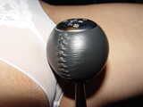 Masturbating on a gear knob