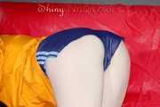 HOT HOT HOT - Lucy wearing sexy shiny nylon down shoes, a darkblue shiny nylon shorts and an orange rain jacket cleaning the studio (Pics)