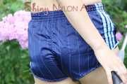 Watching Aiyana wearing only a sexy blue shiny nylon shorts watering the garden (Pics)