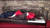 Mara tied and gagged on a princess bed in an old cellar wearing a sexy red sauna suit (Video)