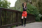 Miss Petra in hot vinyl skirt and overknee boots at the photo shoot