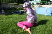 Watch Sandra beeing bound and gagged in her shiny nylon Downwear in the Garden