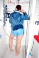 Watching Jill during taking a shower in an oldschool lightblue shiny nylon shorts and a blue rainjacket (Pics)