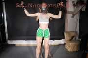 ***RONJA*** being tied and gagged overhead with ropes and a special combination of nylon over head and tape gagg from STELLA both wearing sexy shiny nylon shorts and tops (Pics)