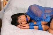 Exotic Slut in Blue Bondage