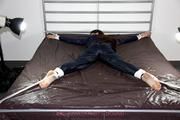 Shelly bound and gagged in shiny nylon clothes