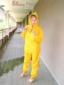 Leonie wearing a super sexy yellow rainwear combination posing outdoor (Pics)