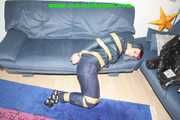 Get 548 Pictures with Jill tied and gagged in shiny nylon rainwear from 2005-2008!
