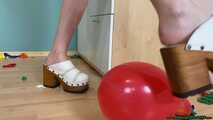 stomp2pop the balloons with her clogs shoes